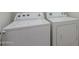 Laundry room featuring a white washer and dryer set at 21277 E Cherrywood Dr, Queen Creek, AZ 85142