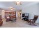Open-concept layout showcasing the living room connected to the kitchen, creating an inviting atmosphere at 21277 E Cherrywood Dr, Queen Creek, AZ 85142