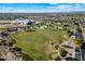 Aerial image of a community park with baseball field, school, and a residential neighborhood in the background at 22842 E Via Las Brisas --, Queen Creek, AZ 85142