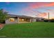 Expansive backyard with lush lawn, ideal for entertaining or enjoying a peaceful retreat at 22842 E Via Las Brisas --, Queen Creek, AZ 85142