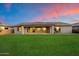 Large backyard with a well-maintained lawn, perfect for outdoor activities and relaxation at 22842 E Via Las Brisas --, Queen Creek, AZ 85142