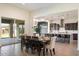 Elegant dining area leading to the kitchen and backyard, perfect for entertaining at 22842 E Via Las Brisas --, Queen Creek, AZ 85142
