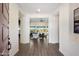 Grand foyer with wood-look tile flooring and an open view into the bright, airy living space at 22842 E Via Las Brisas --, Queen Creek, AZ 85142