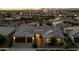 Beautiful single-story home featuring desert landscaping, a three-car garage and a welcoming entrance at 22842 E Via Las Brisas --, Queen Creek, AZ 85142
