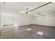 Spacious garage with epoxy floor, overhead lighting, and automatic door openers at 22842 E Via Las Brisas --, Queen Creek, AZ 85142
