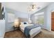 Serene bedroom with vaulted ceilings, neutral color palette, and plush carpeting for ultimate comfort at 2402 E 5Th St # 1741, Tempe, AZ 85288