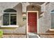 Charming front entrance with a red door and the address number 1741 at 2402 E 5Th St # 1741, Tempe, AZ 85288