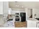 Well-appointed kitchen features stainless steel appliances, marble countertops, and ample cabinet space at 2402 E 5Th St # 1741, Tempe, AZ 85288