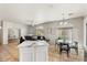 Open concept kitchen and living room with modern island and breakfast bar, great for entertaining at 2402 E 5Th St # 1741, Tempe, AZ 85288