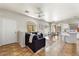 Inviting living room featuring tile flooring, modern furnishings, and abundant natural light from large windows at 2402 E 5Th St # 1741, Tempe, AZ 85288
