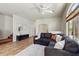 Comfortable living room with plush seating, neutral decor, and cozy carpeting for a relaxing atmosphere at 2402 E 5Th St # 1741, Tempe, AZ 85288