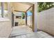 Spacious covered patio area featuring concrete flooring, offering a shaded outdoor space for relaxation at 2402 E 5Th St # 1741, Tempe, AZ 85288
