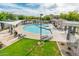 Resort-style community pool with comfortable lounge chairs and shaded areas, perfect for relaxation and fun at 2402 E 5Th St # 1741, Tempe, AZ 85288