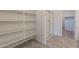 This bathroom has a glass shower and a large storage shelf at 24184 W Gibson Ln, Buckeye, AZ 85326