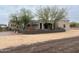 Charming home with desert landscaping and unique architectural design at 2427 W Desert Hills Estate Dr, Phoenix, AZ 85086