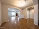 Open-concept living area with tile flooring and arched doorway, great for entertaining guests at 2427 W Desert Hills Estate Dr, Phoenix, AZ 85086