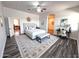 Serene main bedroom with a plush bed, decorative rug, and access to an ensuite bathroom at 2427 W Desert Hills Estate Dr, Phoenix, AZ 85086