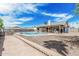Spacious backyard with a pool, patio, and plenty of room for outdoor activities at 3047 W Sandra Ter, Phoenix, AZ 85053