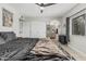 The bedroom includes a black ceiling fan, closet, and neutral walls at 3047 W Sandra Ter, Phoenix, AZ 85053