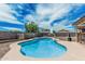 Enjoy the refreshing in-ground pool, basketball hoop, and low-maintenance landscaping in this backyard oasis at 3047 W Sandra Ter, Phoenix, AZ 85053