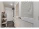Laundry room features a washer, dryer, and storage racks at 30517 W Lynwood St, Buckeye, AZ 85396