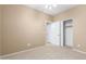 Cozy bedroom with carpet flooring, neutral walls, and a ceiling fan, offering a peaceful retreat at 3239 S Tatum Ln, Gilbert, AZ 85297