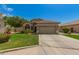 Charming single-Gathering home with a two-car garage and well-manicured lawn at 3239 S Tatum Ln, Gilbert, AZ 85297