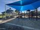 Community playground features shade, climbing structures, and sand, perfect for outdoor fun at 3239 S Tatum Ln, Gilbert, AZ 85297