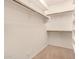 Well-organized walk-in closet with ample shelving and hanging space, providing efficient storage solutions at 3239 S Tatum Ln, Gilbert, AZ 85297