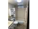 Neutral bathroom with shower-tub combination, storage cabinet, and modern fixtures at 3330 E Main St # 256, Mesa, AZ 85213