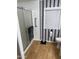 Cozy bathroom with shower featuring a safety grab bar and a window for natural light at 3330 E Main St # 256, Mesa, AZ 85213