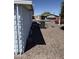 This home features low-maintenance desert landscaping around the AC unit at 3330 E Main St # 256, Mesa, AZ 85213