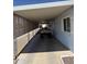 Spacious carport featuring a golf cart, providing convenient parking and protection from the elements at 3330 E Main St # 256, Mesa, AZ 85213