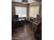 Home office with a desk, computer setup, and ample storage space with boxes at 3330 E Main St # 256, Mesa, AZ 85213