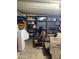 Well-organized storage room with shelves and chairs, offering versatile storage solutions at 3330 E Main St # 256, Mesa, AZ 85213