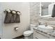 Modern bathroom featuring a stylish vanity, decorative towels and a sleek shower at 34096 N 87Th Way, Scottsdale, AZ 85266