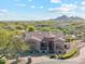 Beautiful aerial view of a home featuring a desert landscape and mountain views at 34096 N 87Th Way, Scottsdale, AZ 85266