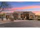 Stunning single-story home boasts stone accents, a tile roof, and manicured desert landscaping at 34096 N 87Th Way, Scottsdale, AZ 85266