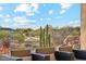 Charming outdoor space with comfortable seating and views of the surrounding desert landscape at 34096 N 87Th Way, Scottsdale, AZ 85266