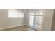 Office space with wood flooring, window and french doors leading to the living room at 3434 E Baseline Rd # 168, Phoenix, AZ 85042