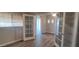 Open office with french doors leading to the living room and a large bright window at 3434 E Baseline Rd # 168, Phoenix, AZ 85042