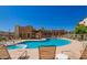 Tranquil community pool featuring a hot tub and lounge chairs, ideal for leisure at 3434 E Baseline Rd # 168, Phoenix, AZ 85042