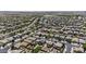 Aerial view of neighborhood featuring many homes with private backyards at 40749 W Thornberry Ln, Maricopa, AZ 85138