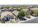 An aerial view of the charming single-story home located in a quiet residential neighborhood at 40749 W Thornberry Ln, Maricopa, AZ 85138
