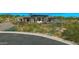 Desert landscaping surrounds this modern home with an inviting outdoor entertainment area at 41639 N 113Th Pl, Scottsdale, AZ 85262