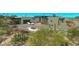 Modern home featuring beautiful desert landscaping and driveway parking at 41639 N 113Th Pl, Scottsdale, AZ 85262