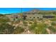 Modern home surrounded by desert landscaping with mountain views at 41639 N 113Th Pl, Scottsdale, AZ 85262