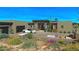 Home's exterior displaying desert landscaping, brickwork, 2-car garage and modern architecture at 41639 N 113Th Pl, Scottsdale, AZ 85262