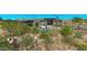 Beautiful modern home with desert landscaping and parking for multiple vehicles at 41639 N 113Th Pl, Scottsdale, AZ 85262