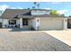 Charming single-Gathering home featuring a gravel front yard and convenient two-car garage at 4521 W Buffalo St, Chandler, AZ 85226